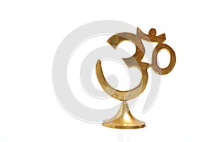 Figure of golden indian symbol aum photo