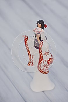 The figure of a Japanese geisha with a fan 1769.