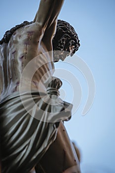 Figure of Jesus on the cross carved in wood by the sculptor Alva