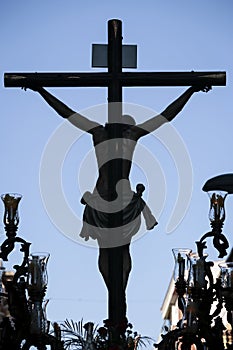 Figure of Jesus on the cross carved in wood by the sculptor Alva photo