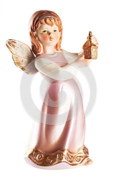 Figure of a little angel with lantern in hands, christmas decoration, isolated on white photo