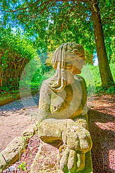 The figure of mermaid with cat's pows in park of Olesko Castle, Ukraine