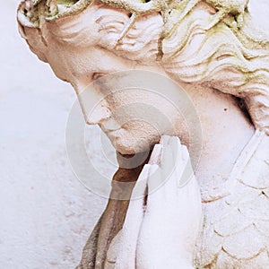 Figure of a praying angel Religion, faith, sin, salvation conce