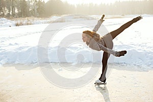 Figure skating woman at the frozen lake