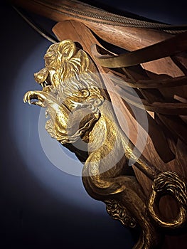 Golden carved lion figurehead