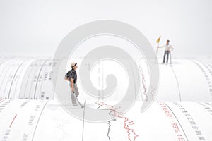 a  figures of golfers playing a golf at the open book