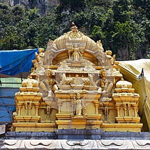Figures of Hindu deities on the roof of the temple