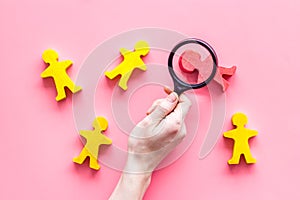 Figures of people on pink desk top view. Human resources, hiring and recruitment concept