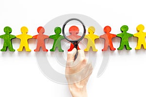 Figures of people on white desk top view. Human resources, hiring and recruitment concept