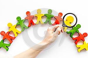 Figures of people on white desk top view. Human resources, hiring and recruitment concept