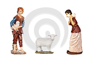 Figures of the portal of nativity scene, shepherds and sheep