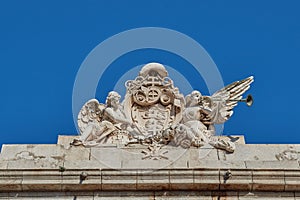 Figures of winged women of the Lorenzana University Palace in Toledo, Spain