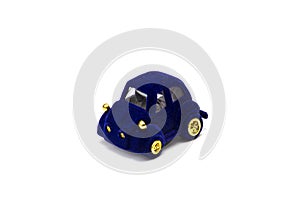 Figurine of a blue velvet car on a white background