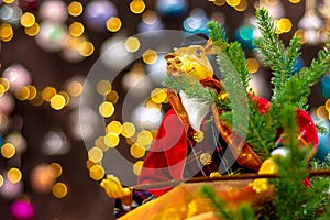 Figurine of a bull in a classic suit of an Englishman on a Christmas tree