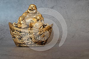 Figurine Cheerful Hotei - Image. Smiling Buddha - Chinese God of Happiness, Wealth and Lucky Isolated on gray - Image