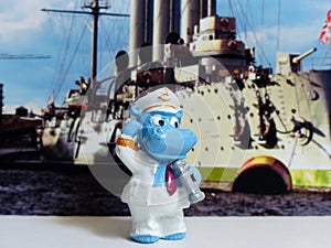 Figurine hippo-captain near his ship. Hobby. Kinderfilia - collecting children`s toys and souvenirs from kinder surprise