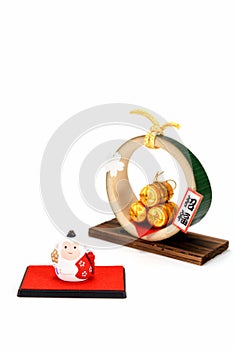 Figurine of Monkey and Three golden straw rice bags.