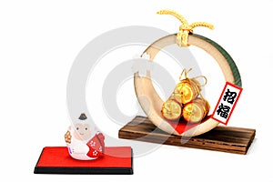 Figurine of Monkey and Three golden straw rice bags.