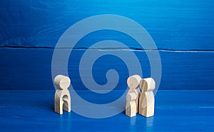 Figurine with a void shape of a child and family of parents with a child. Surrogacy concept. Artificial insemination, bearing photo