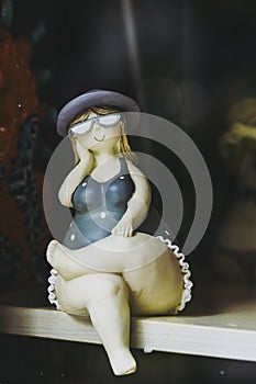 Figurine of a woman in a bathing suit, decorative object in the shape of a bather