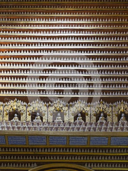 Figurines of Buddha inside the temple photo