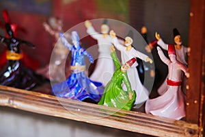 figurines of dervishes for sale on a street market in Istnabul, Turkey