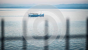 A fihing boat on the calm waters of the Gulf of Trieste