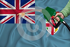 FIJI flag Close-up shot on waving background texture with Fuel pump nozzle in hand. The concept of design solutions. 3d rendering