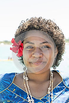 Fijian woman with Hibiscus Bloom