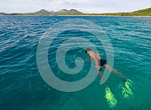 Fijian man snorkeling in Yasawa Island Fiji