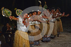 Fijian women dancing a traditional female dance Meke the fan dan