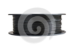 Filament for 3d printing. Black thermoplastic. Isolated on white background.