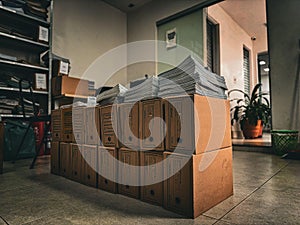 FILE BOXES WITH DOCUMENTS ON TOP