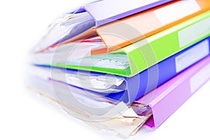 File Folder Binder stack of multi color in office.