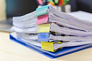 File folder and Stack of business report paper file on the table in a work office