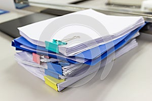 File folder and Stack of business report paper file on the table in a work office