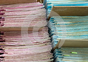 File folders in a file cabinet, card catalog in a library, closeup