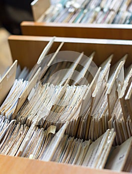 File folders in a file cabinet, card catalog in a library,
