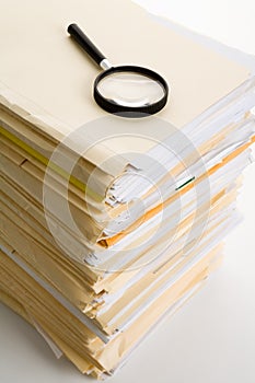 File Stack and Magnifying Glass