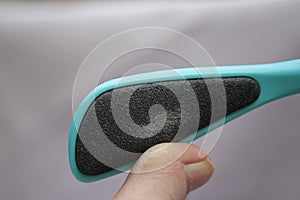 With the file on the toe