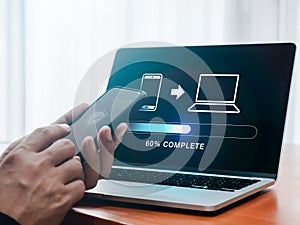File transfer, data migration, transmission, backup files concept. Loading progress bar and smartphone sending to computer, icons