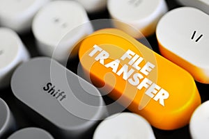 File Transfer - exchange of data files between computer systems, text concept button on keyboard