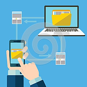 File transfer. Hand holding smartphone with folder on screen and documents transferred to computer. Copy files, exchange