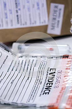 Files and evidence bag in a crime lab