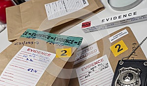 Files and evidence bag in a crime lab