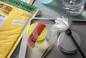 Files and evidence bag in a crime lab