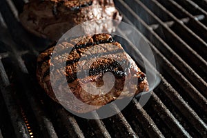Filet mignon beef on grill photo