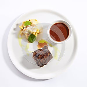 Filet mignon steak with cauliflower dish top view