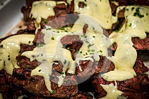 Filet Oscar: Beef Tenderloin topped with a Maryland Crab Cake and Bearnaise Sauce