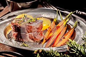 Filet Steak on Metal Plate with Vegetables